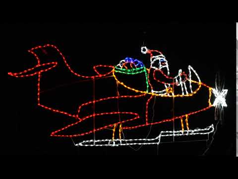 Exhibición LED Animada de Santa Volando un Avión