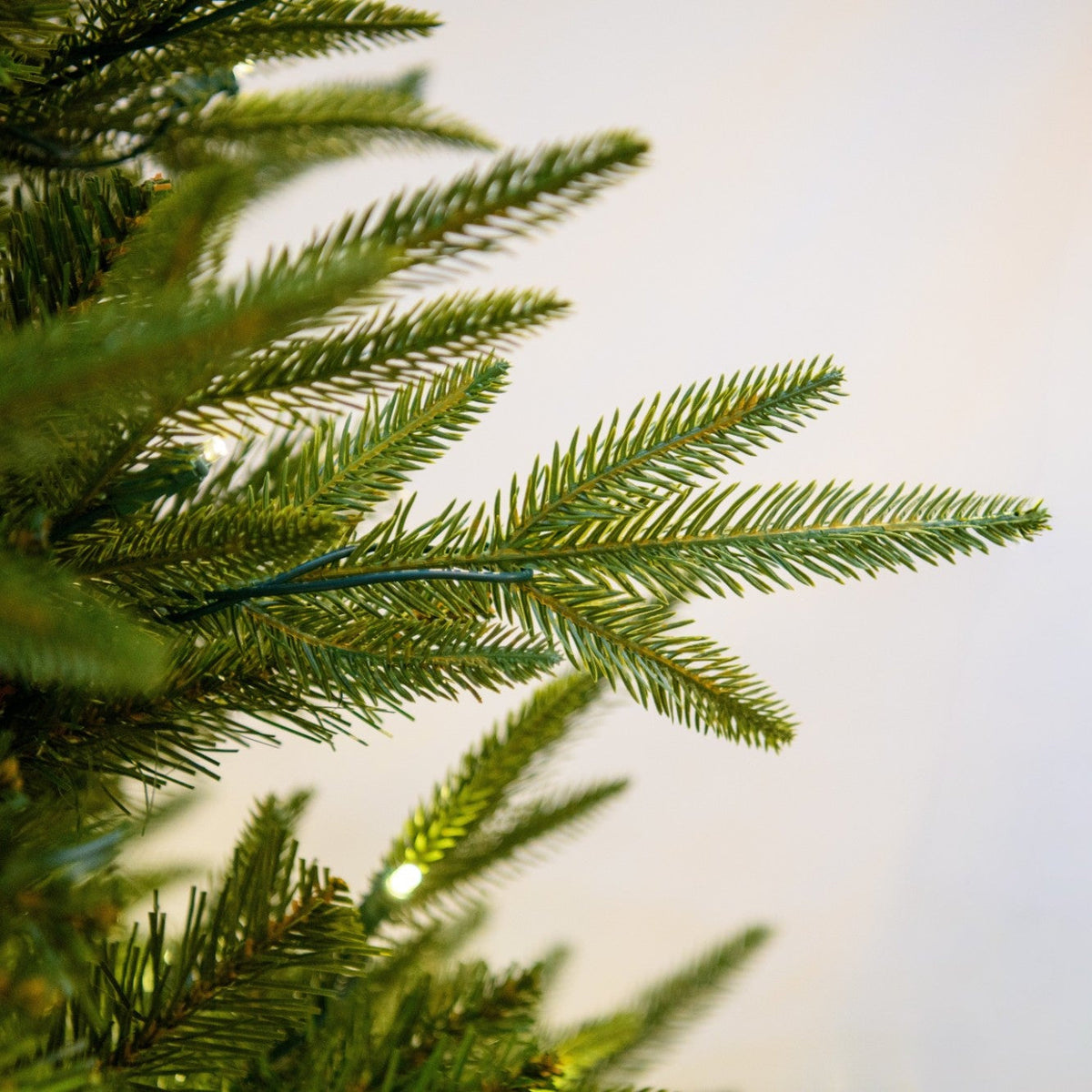 LED 14' Fraser Fir Tree, 2400 Warm White 5MM Concave Lights - Fraser fir needles and warm white lights close-up 3